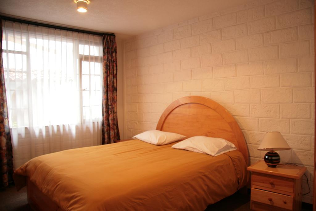 Apartamentos Los Quipus Quito Habitación foto